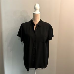 Black crepe button down short sleeved blouse.